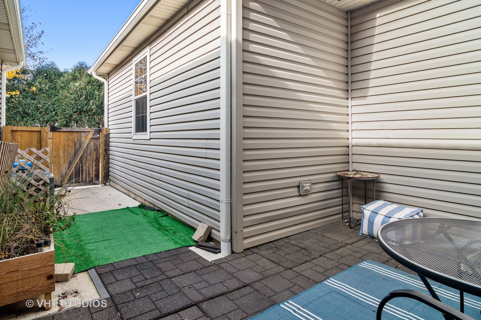 1931 Wagner Road Batavia, IL 60510 - Photo 26 of 27 a view of a chair and tables in the backyard