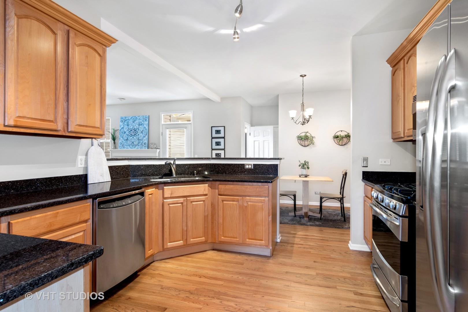 1931 Wagner Road Batavia, IL 60510 - Photo 6 of 27 a kitchen with stainless steel appliances granite countertop a sink stove and refrigerator