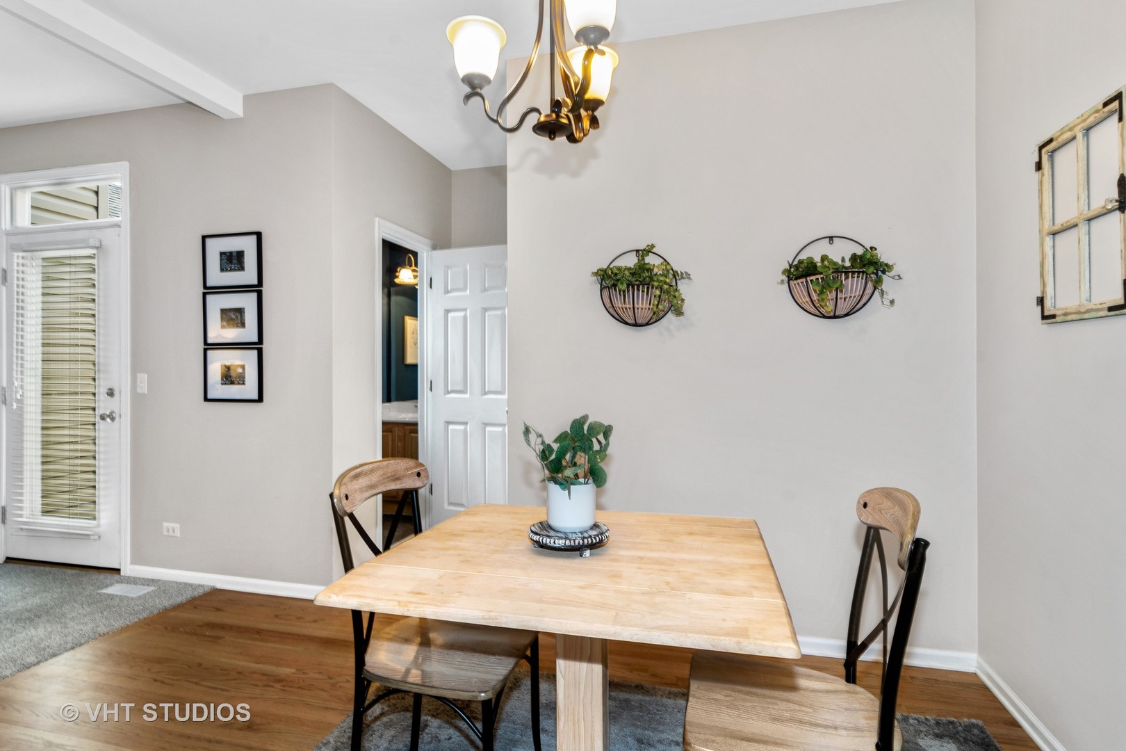 1931 Wagner Road Batavia, IL 60510 - Photo 8 of 27 a view of a dining room with furniture and wooden floor
