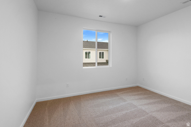 1302 East 1670th North, Unit 908 Payson, UT 84651 - Photo 9 of 21 Unfurnished room featuring light carpet and baseboards