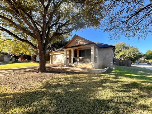 a swimming pool with outdoor seating and yard