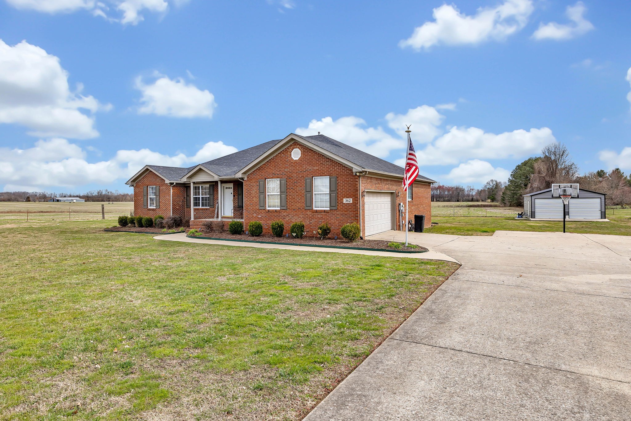 362 Patrick Road Fayetteville, TN 37334 - Photo 3 of 43 a front view of a house with a big yard