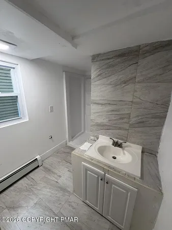 a bathroom with a sink and a vanity