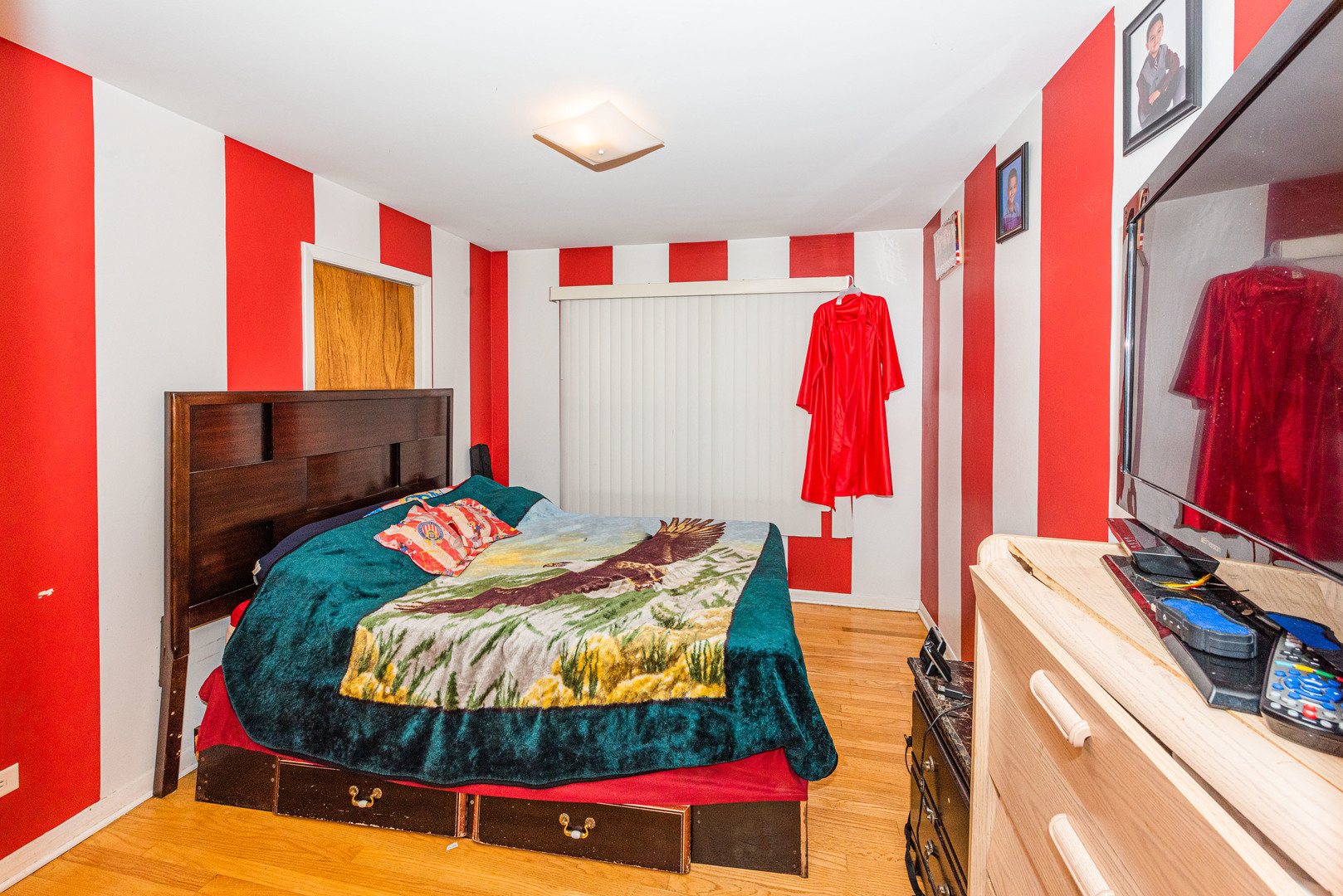 4645 Butterfield Road Hillside, IL 60162 - Photo 22 of 32 a bed room with a bed and a couch