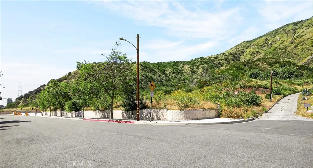 0 Opal Canyon Road Duarte, CA 91010 - Photo 1 of 15 a view of a street with a building in the background