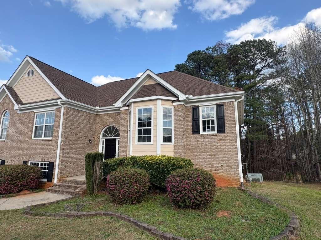 500 Shiver Boulevard Covington, GA 30016 - Photo 2 of 25 a front view of a house with a yard