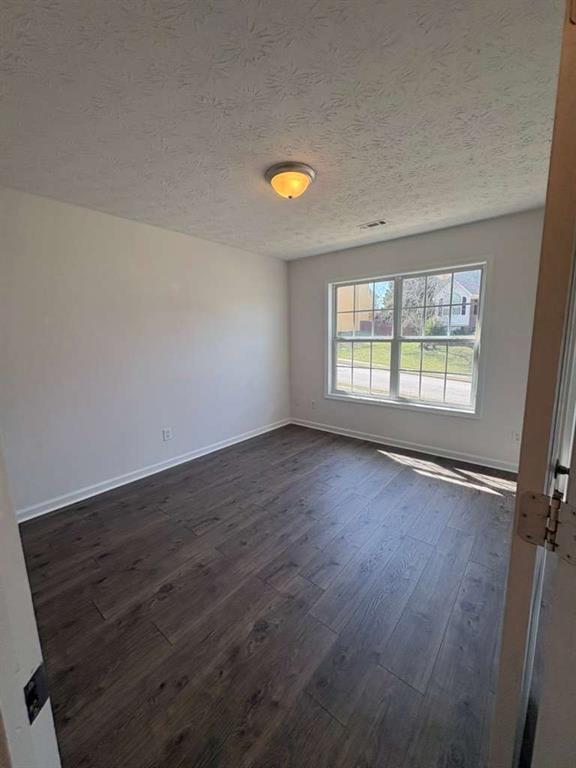 500 Shiver Boulevard Covington, GA 30016 - Photo 23 of 25 an empty room with windows