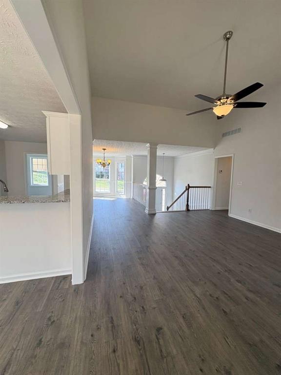 500 Shiver Boulevard Covington, GA 30016 - Photo 7 of 25 a view of empty room with wooden floor and fan
