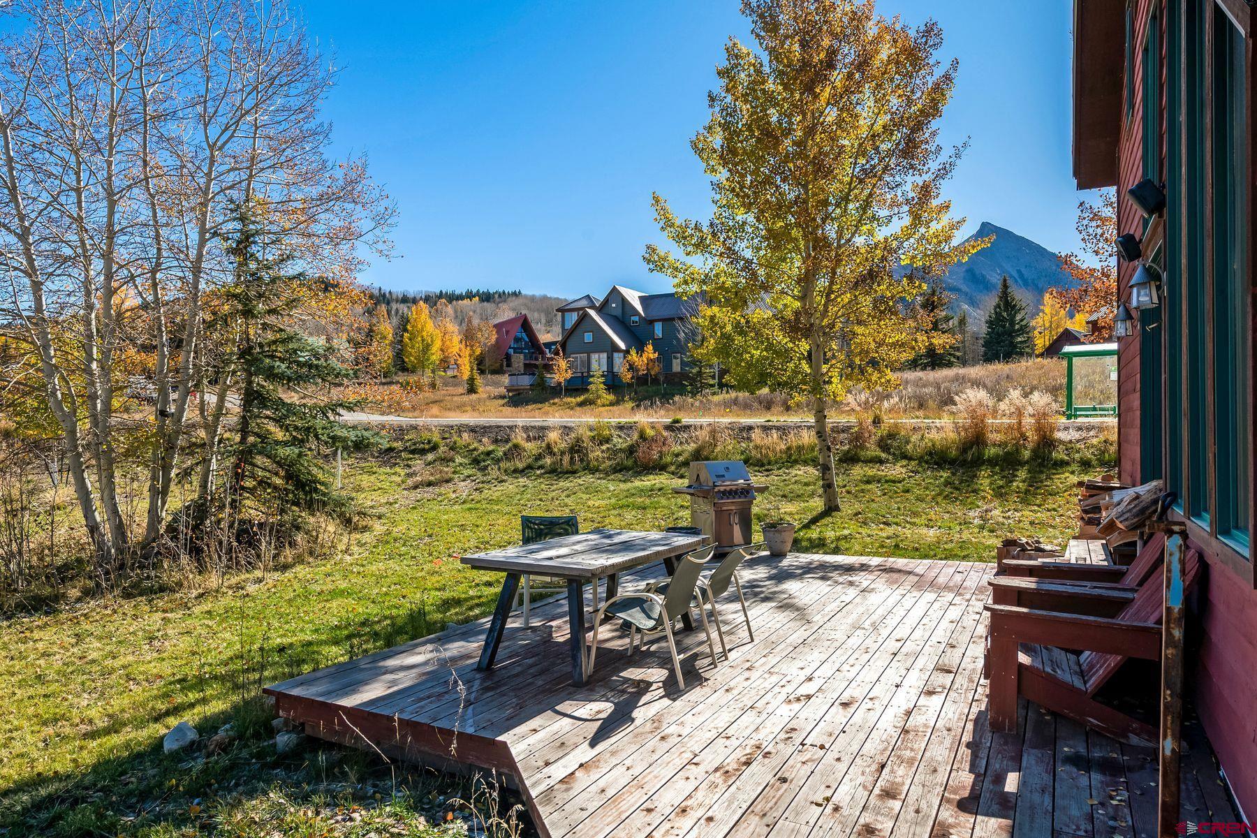 67 Paradise Road Crested Butte, CO 81225 - Photo 14 of 26 a view of a chairs and table in patio
