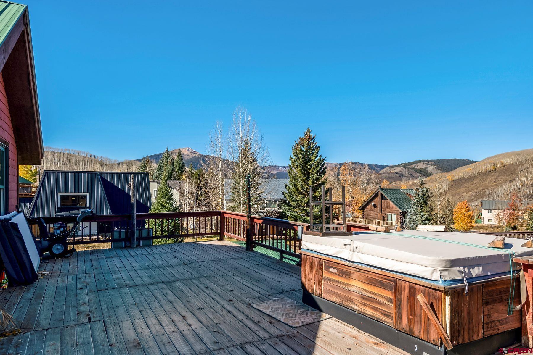 67 Paradise Road Crested Butte, CO 81225 - Photo 16 of 26 a view of a house with roof deck and sitting area