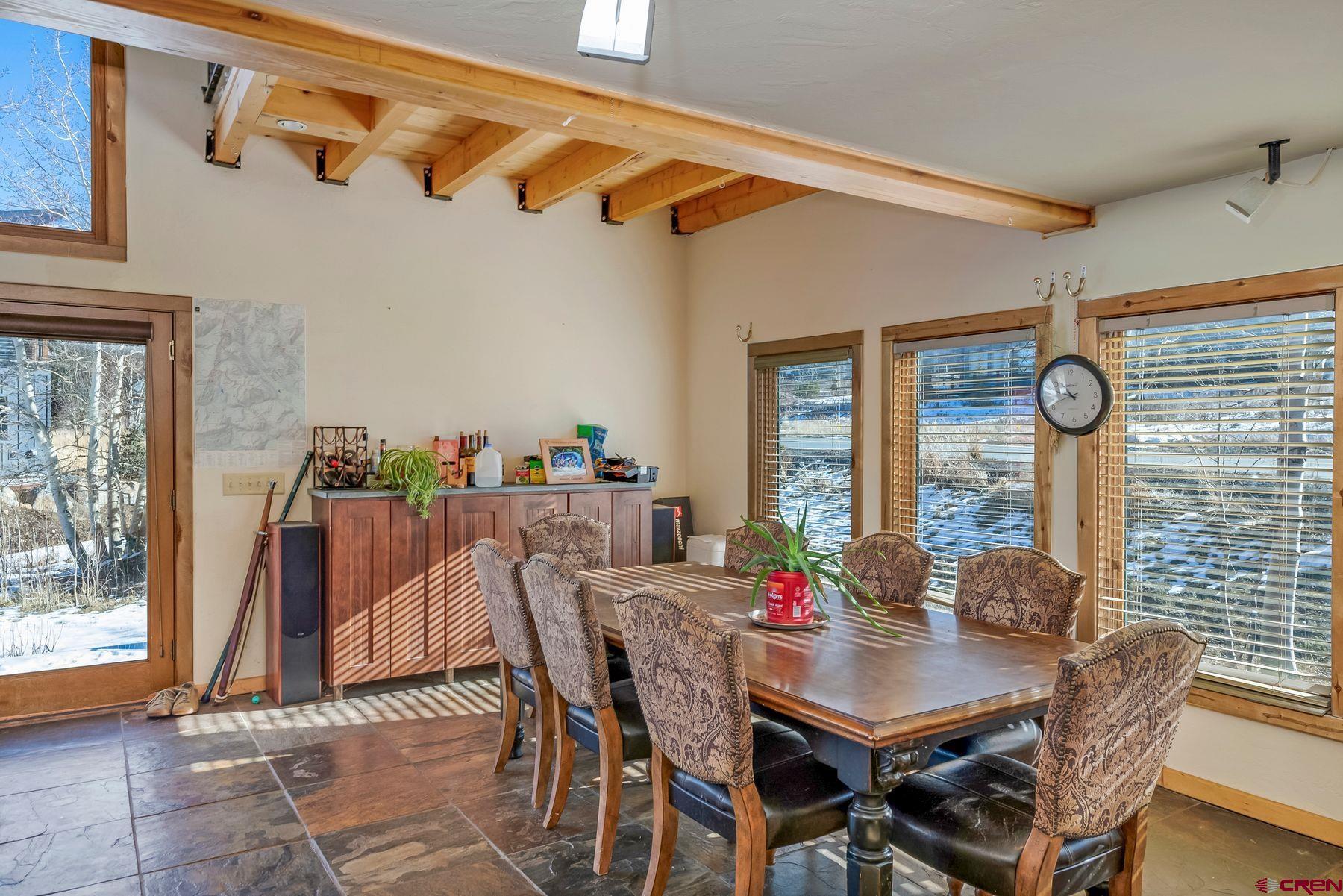 67 Paradise Road Crested Butte, CO 81225 - Photo 7 of 26 a view of a dining room with furniture and window