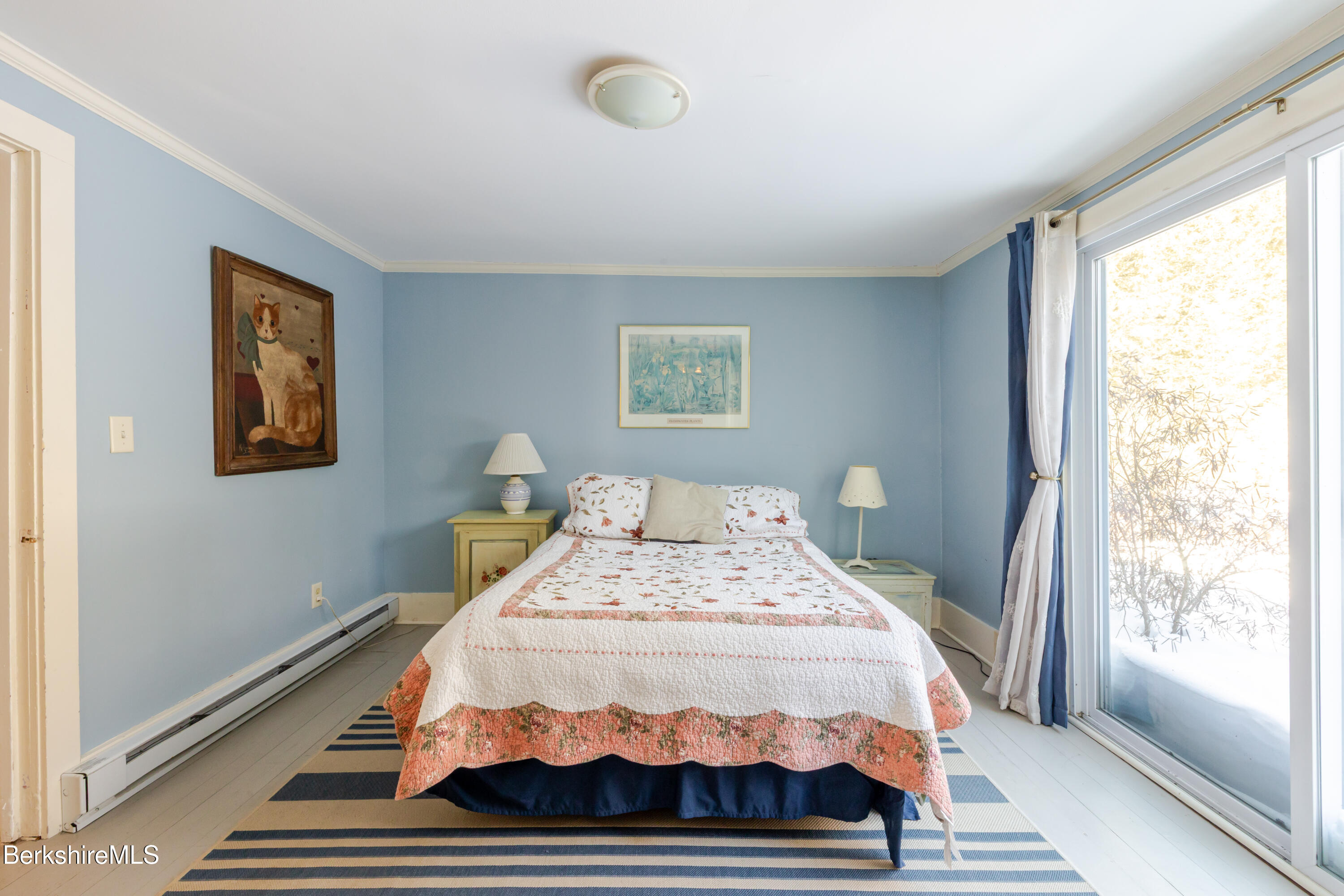 3 Lake Buel Road Great Barrington, MA 01230 - Photo 23 of 55 a bed sitting in a bedroom next to a window