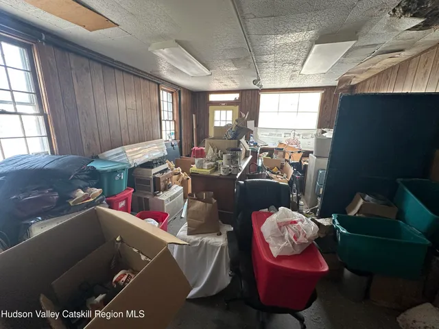 a room with water heater and storage