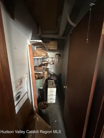 a living room with lots of furniture and a table