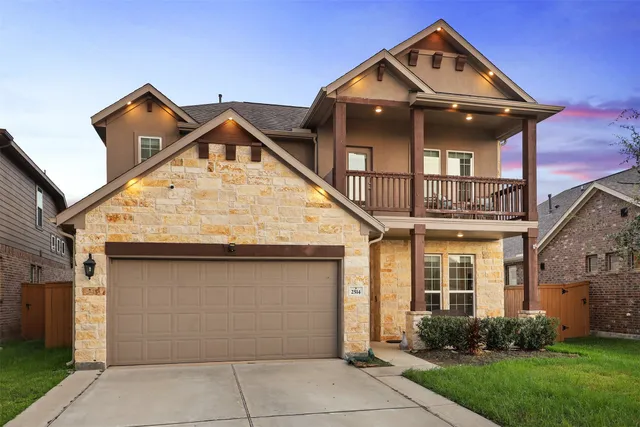 a front view of house with yard