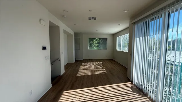 a view of hallway with windows