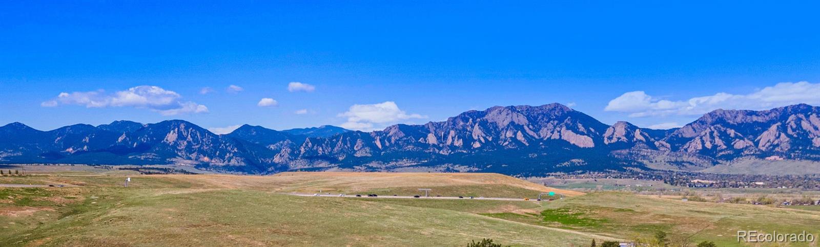 8 Benchmark Drive Boulder, CO 80303 - Photo 11 of 32 a view of a yard with wooden fence