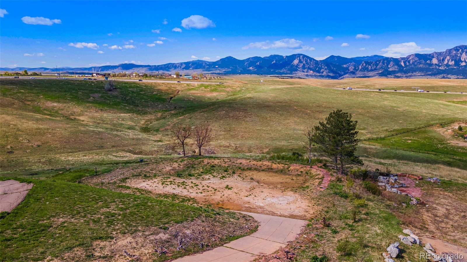 8 Benchmark Drive Boulder, CO 80303 - Photo 14 of 38 a view of a lake with a mountain