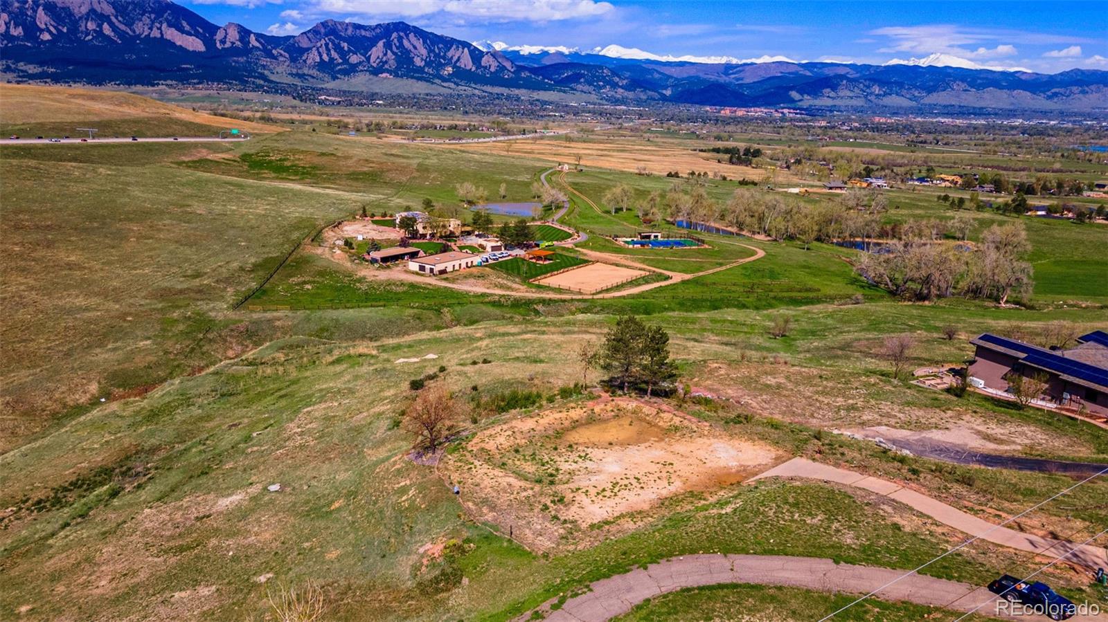 8 Benchmark Drive Boulder, CO 80303 - Photo 18 of 32 a view of a backyard with a table & chairs