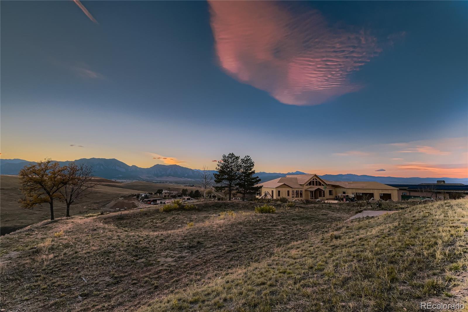 8 Benchmark Drive Boulder, CO 80303 - Photo 23 of 32 a view of a mountain in the distance