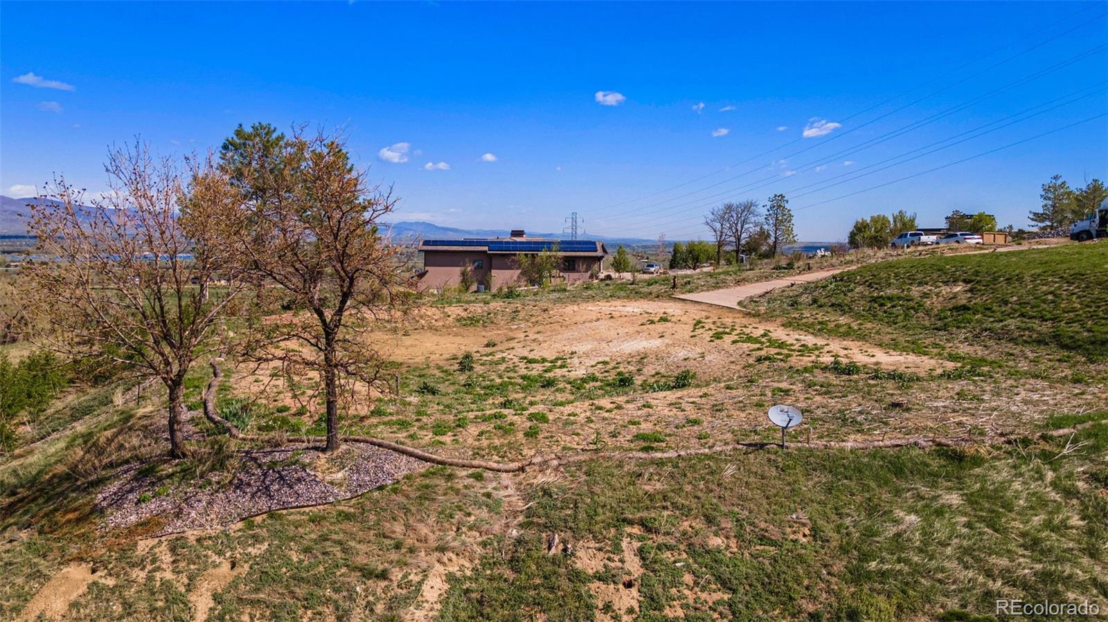 8 Benchmark Drive Boulder, CO 80303 - Photo 27 of 32 a view of a yard with a tree