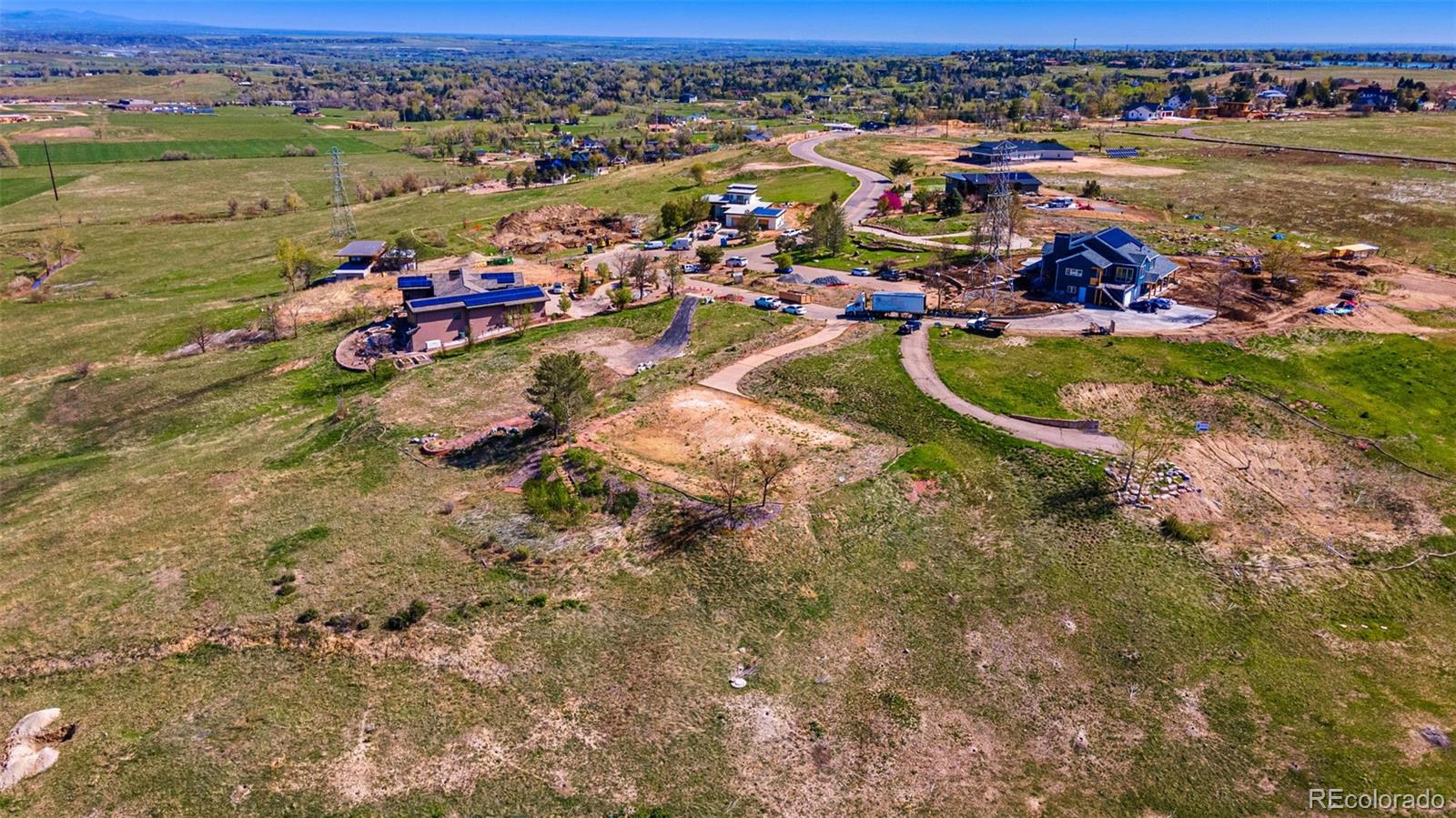 8 Benchmark Drive Boulder, CO 80303 - Photo 30 of 32 an aerial view of a houses with a lake view
