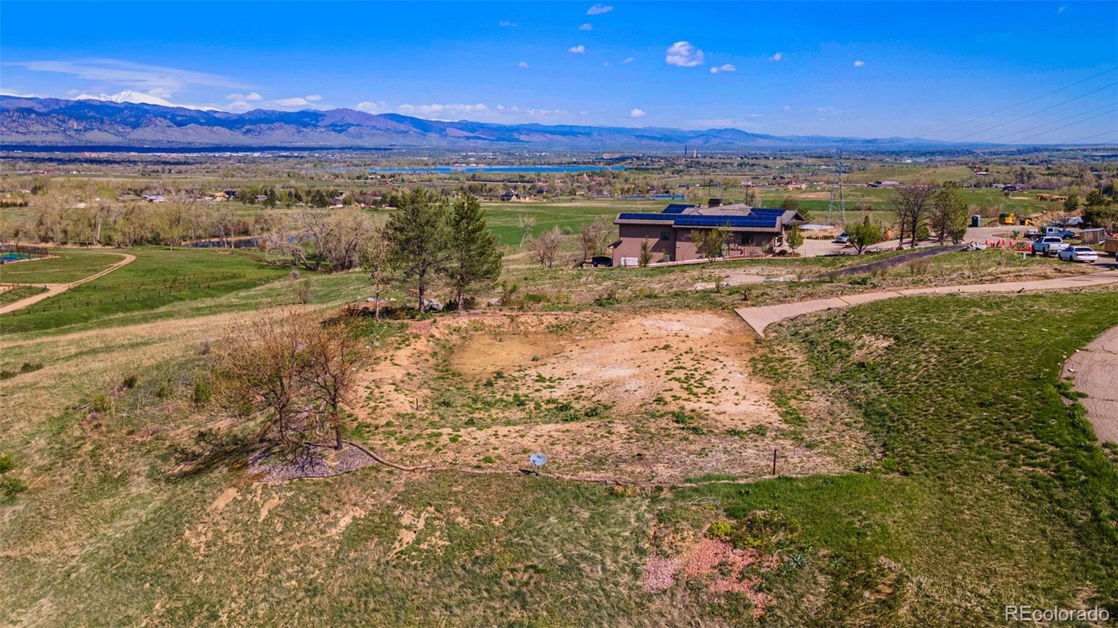 8 Benchmark Drive Boulder, CO 80303 - Photo 5 of 32 a view of a lake with a mountain