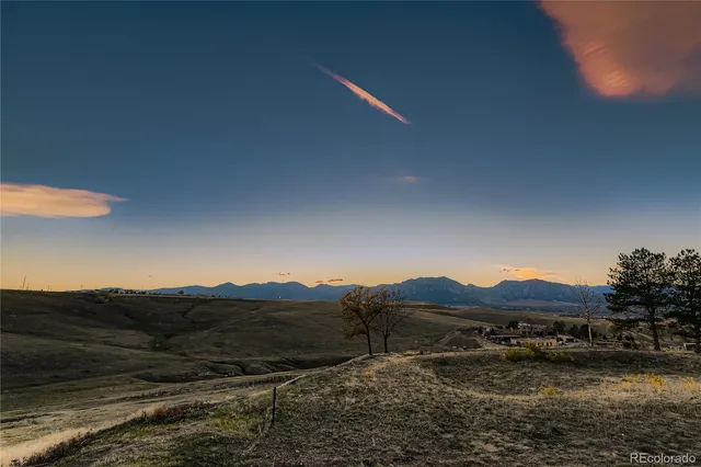 a view of a house with a mountain
