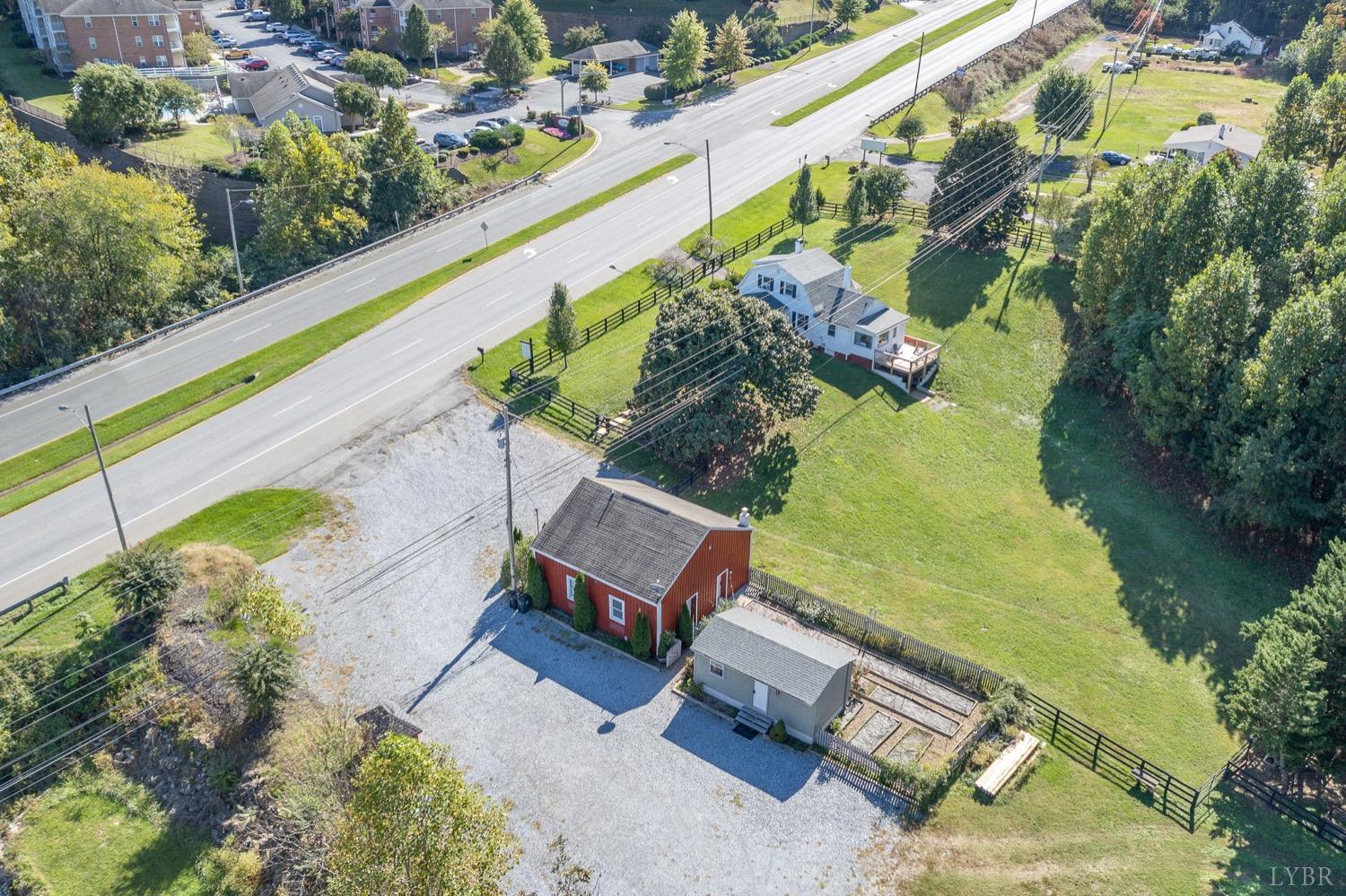 a view of a swimming pool with a yard