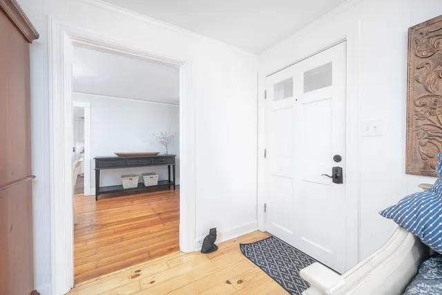 a kitchen with stainless steel appliances a stove microwave and refrigerator