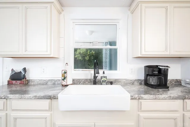 a bedroom with a bed and a television