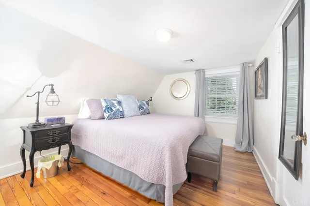 a backyard of a house with plants and trees