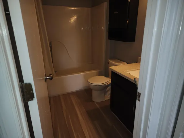 a bathroom with a sink and toilet