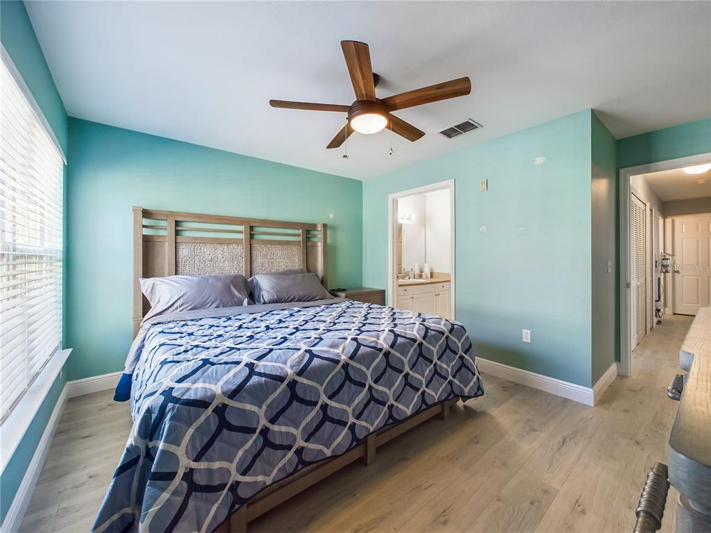 5521 Rosehill Road, Unit 203 Sarasota, FL 34233 - Photo 17 of 51 a bedroom with a bed and window