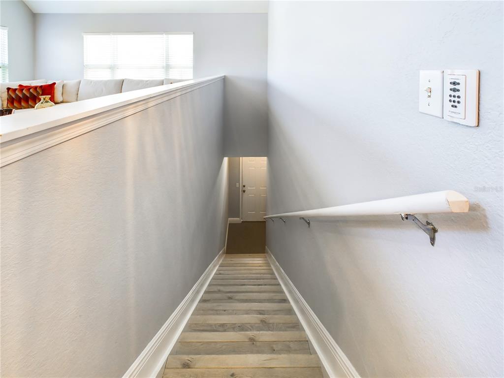 5521 Rosehill Road, Unit 203 Sarasota, FL 34233 - Photo 5 of 51 a view of a hallway with stairs