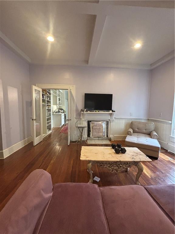 1090 Forrest Avenue Stone Mountain, GA 30083 - Photo 3 of 13 a living room with furniture and a flat screen tv