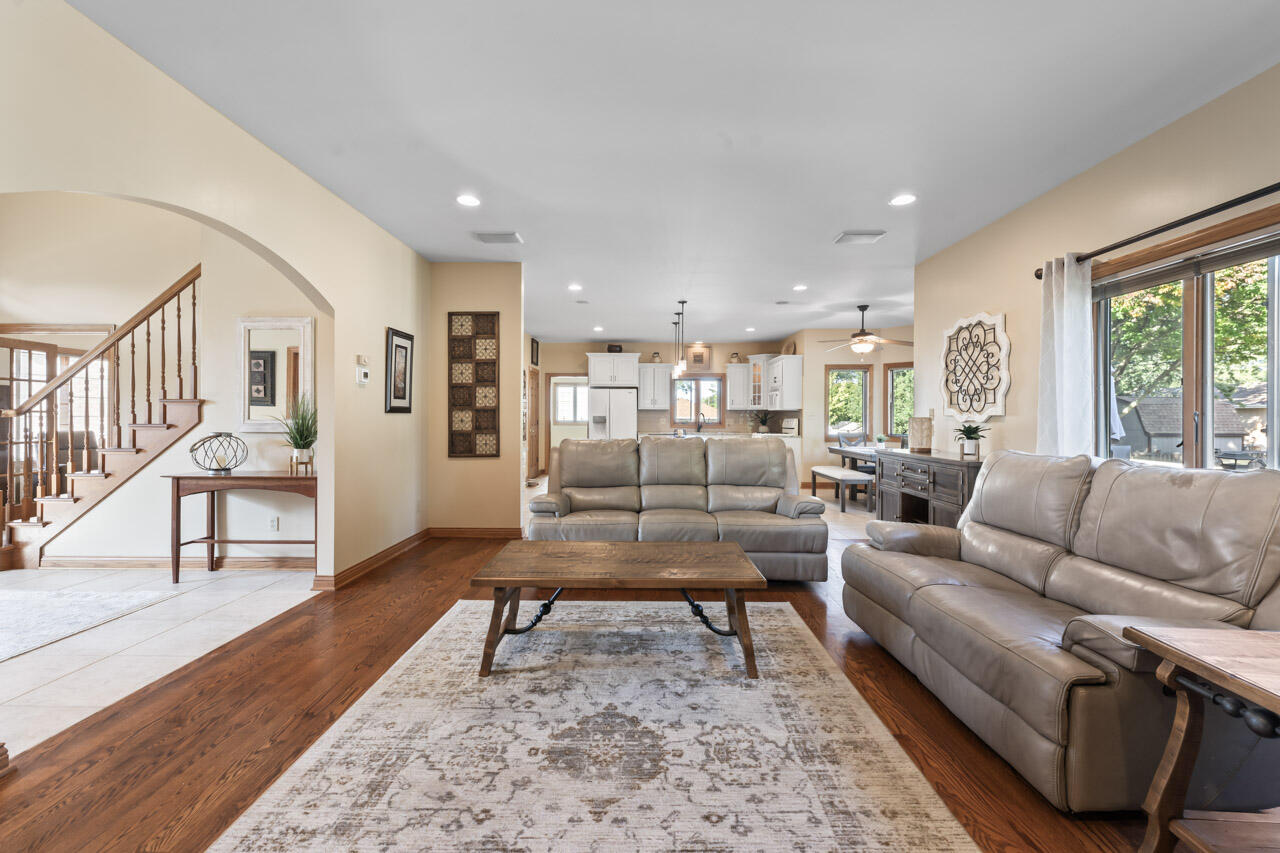 205 North Elgin Street Griffith, IN 46319 - Photo 15 of 43 a living room with furniture wooden floor and a table
