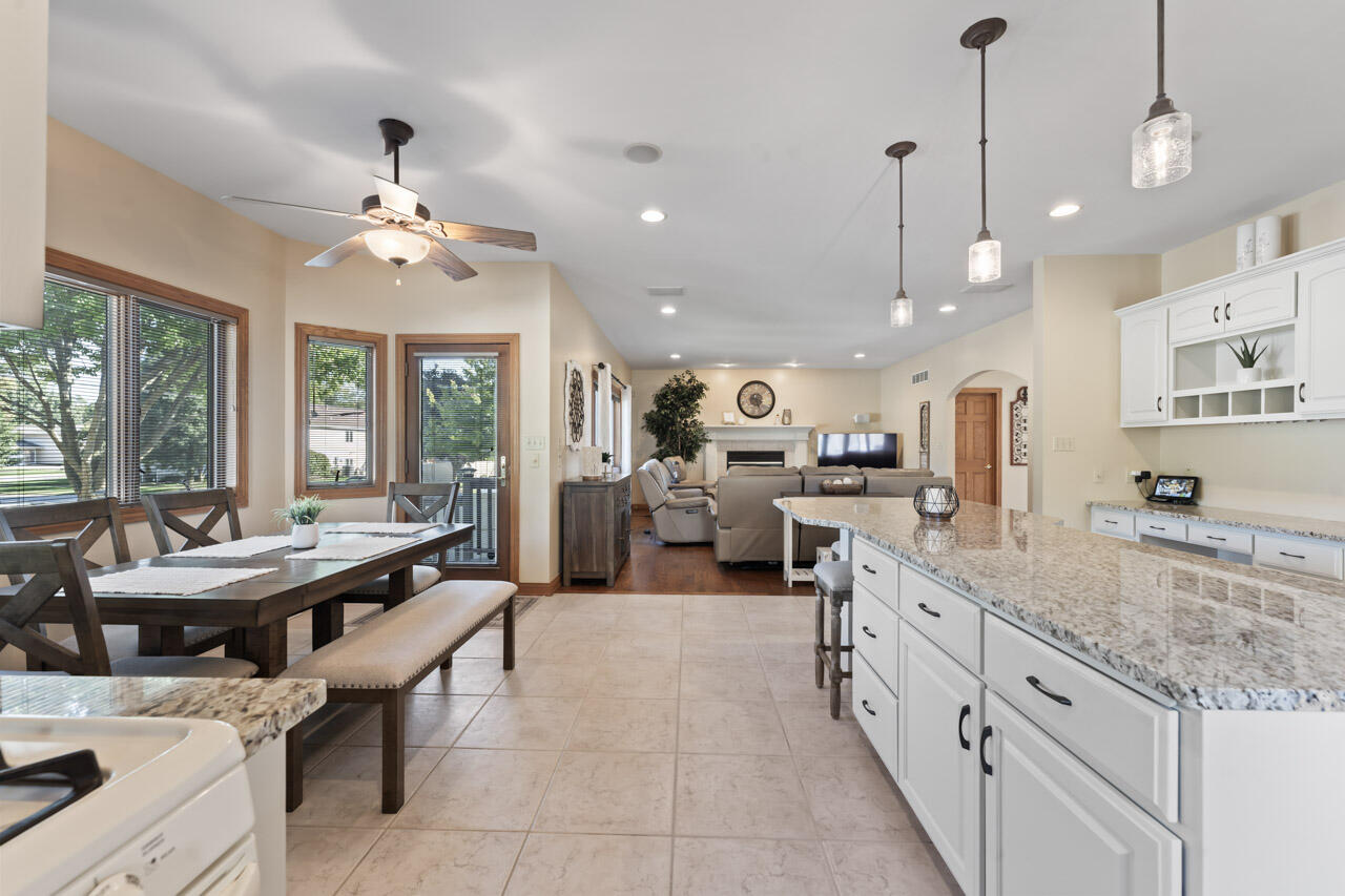205 North Elgin Street Griffith, IN 46319 - Photo 21 of 43 a large kitchen with kitchen island a large counter space a sink appliances and a counter top space
