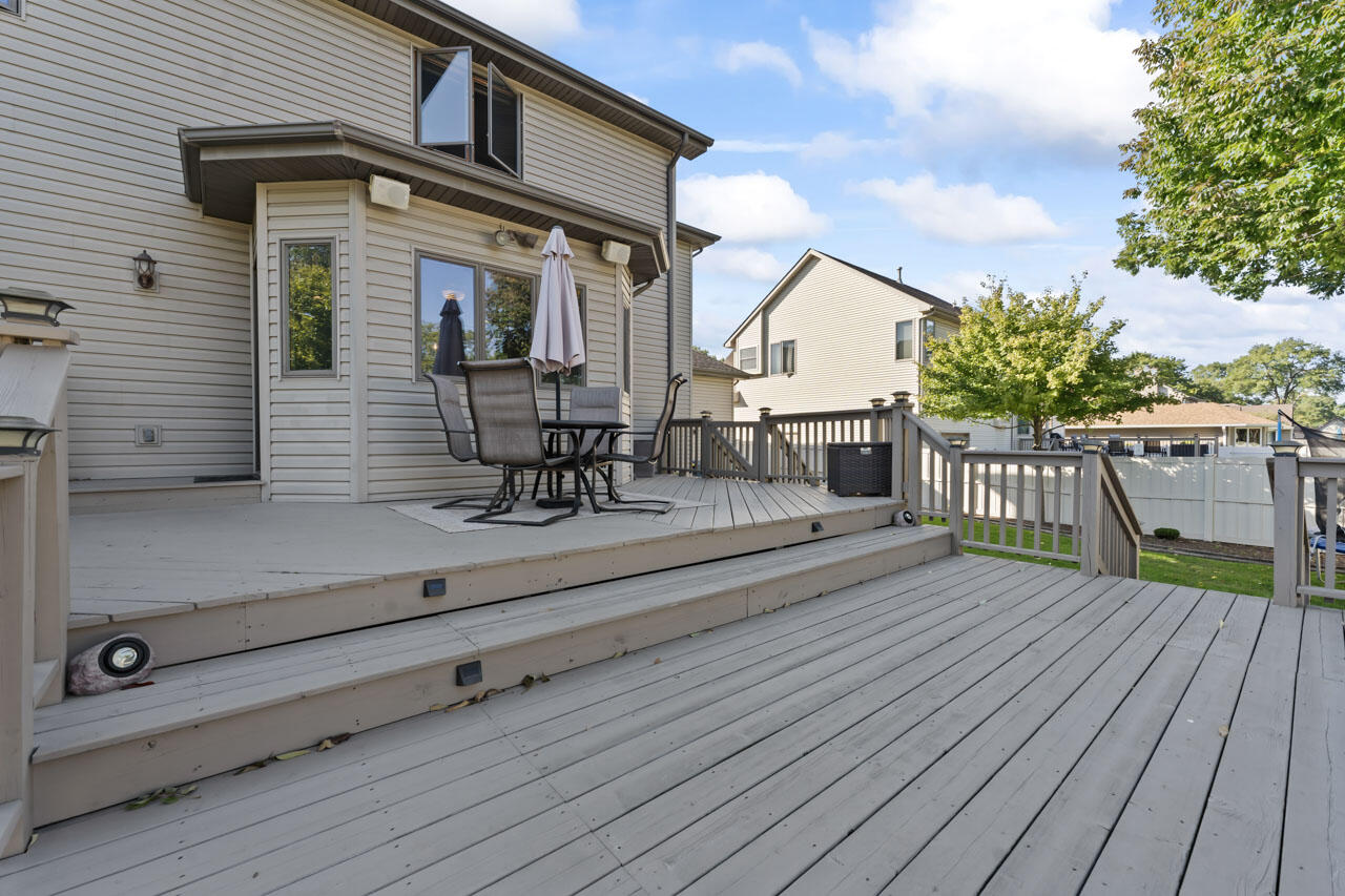 205 North Elgin Street Griffith, IN 46319 - Photo 35 of 43 a view of a house with a deck and furniture