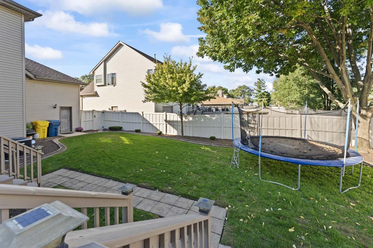 205 North Elgin Street Griffith, IN 46319 - Photo 36 of 43 a view of backyard with deck and garden