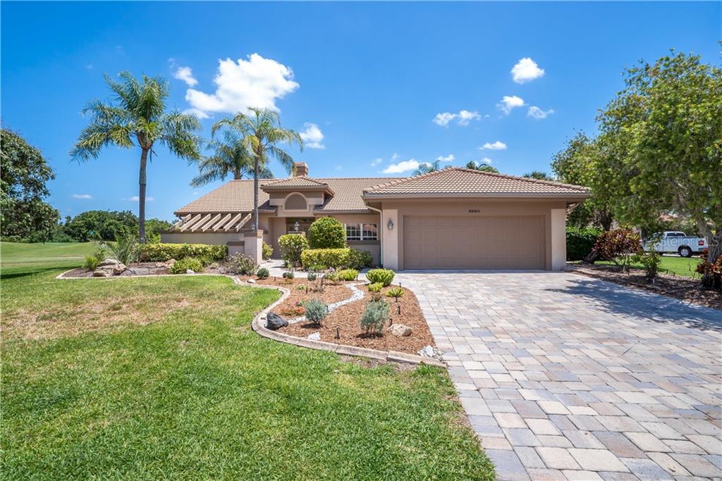 3390 Highlands Bridge Road Sarasota, FL 34235 - Photo 1 of 1 Front with Paver drive and entry