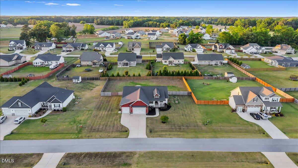 88 Heath Road Lillington, NC 27546 - Photo 51 of 54 an aerial view of a house with a big yard