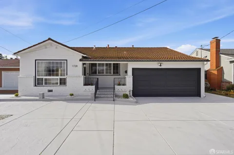 a house view with a outdoor space