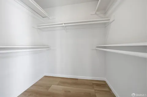 a view of an empty walk in closet