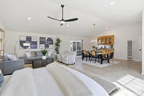 a living room with furniture and a table