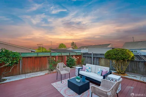 a view of a terrace with furniture
