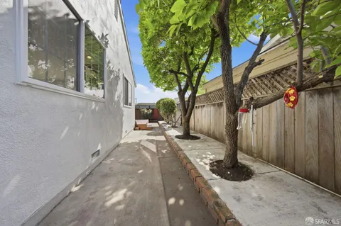 a backyard of a house with seating space