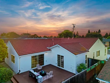 a aerial view of a house with a balcony