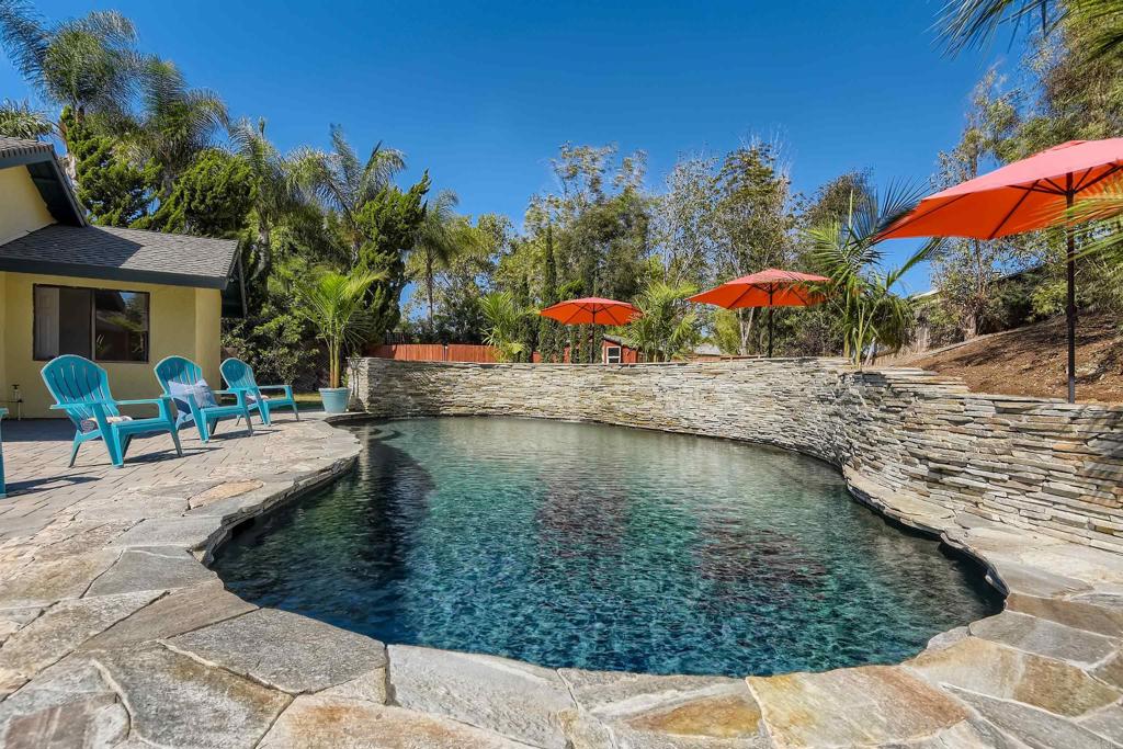 808 Hitching Post Road Vista, CA 92081 - Photo 2 of 29 a view of a lake with a house