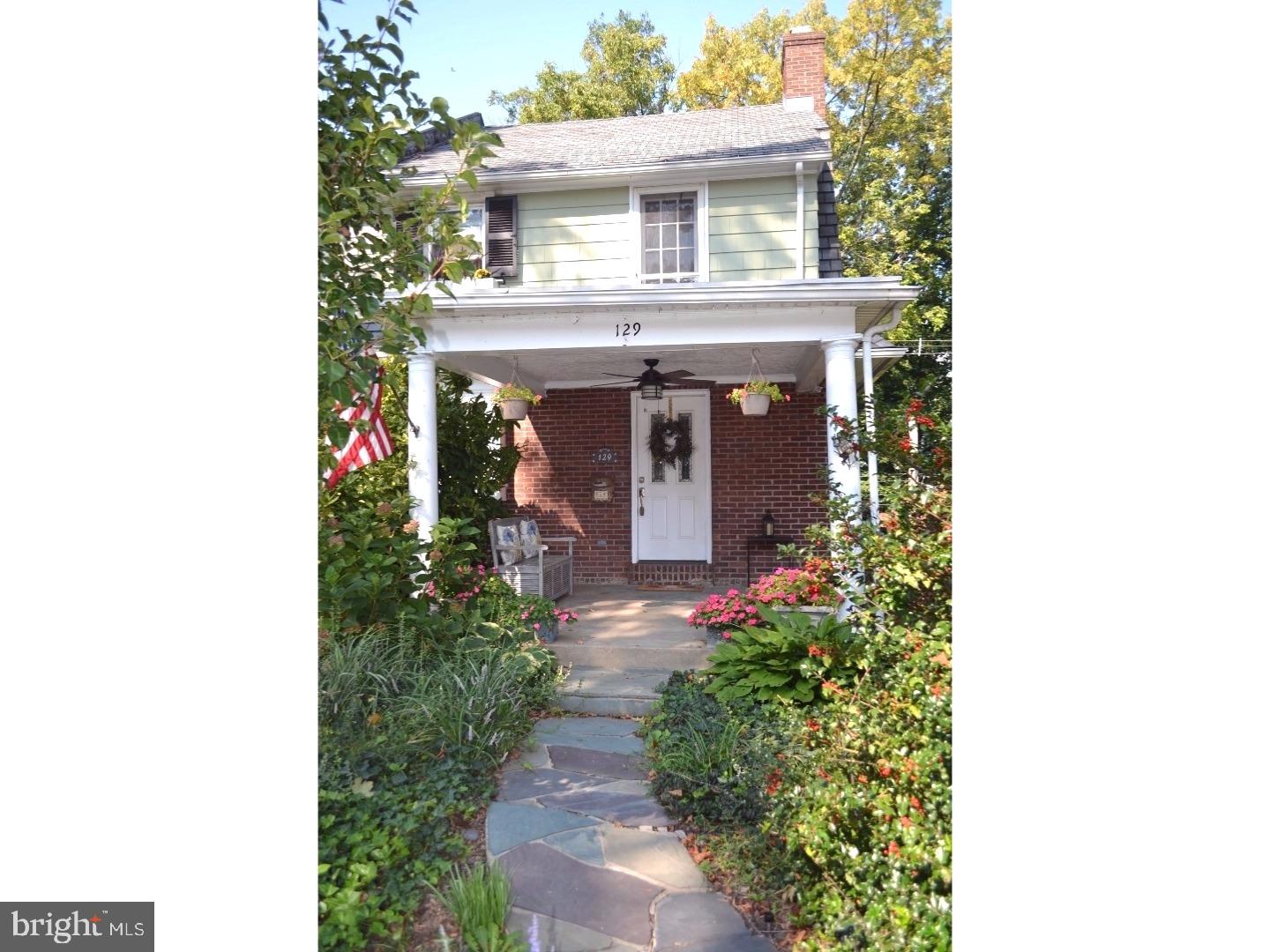 129 Walsh Road Lansdowne, PA 19050 - Photo 2 of 25 a front view of a house with plants